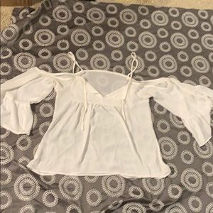 White beautiful silky blouse with shoulder holes